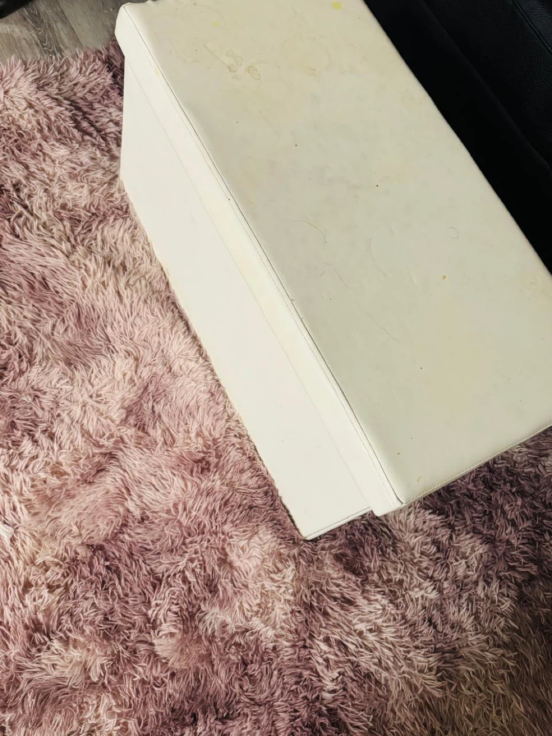 White Storage Ottoman and pink rug