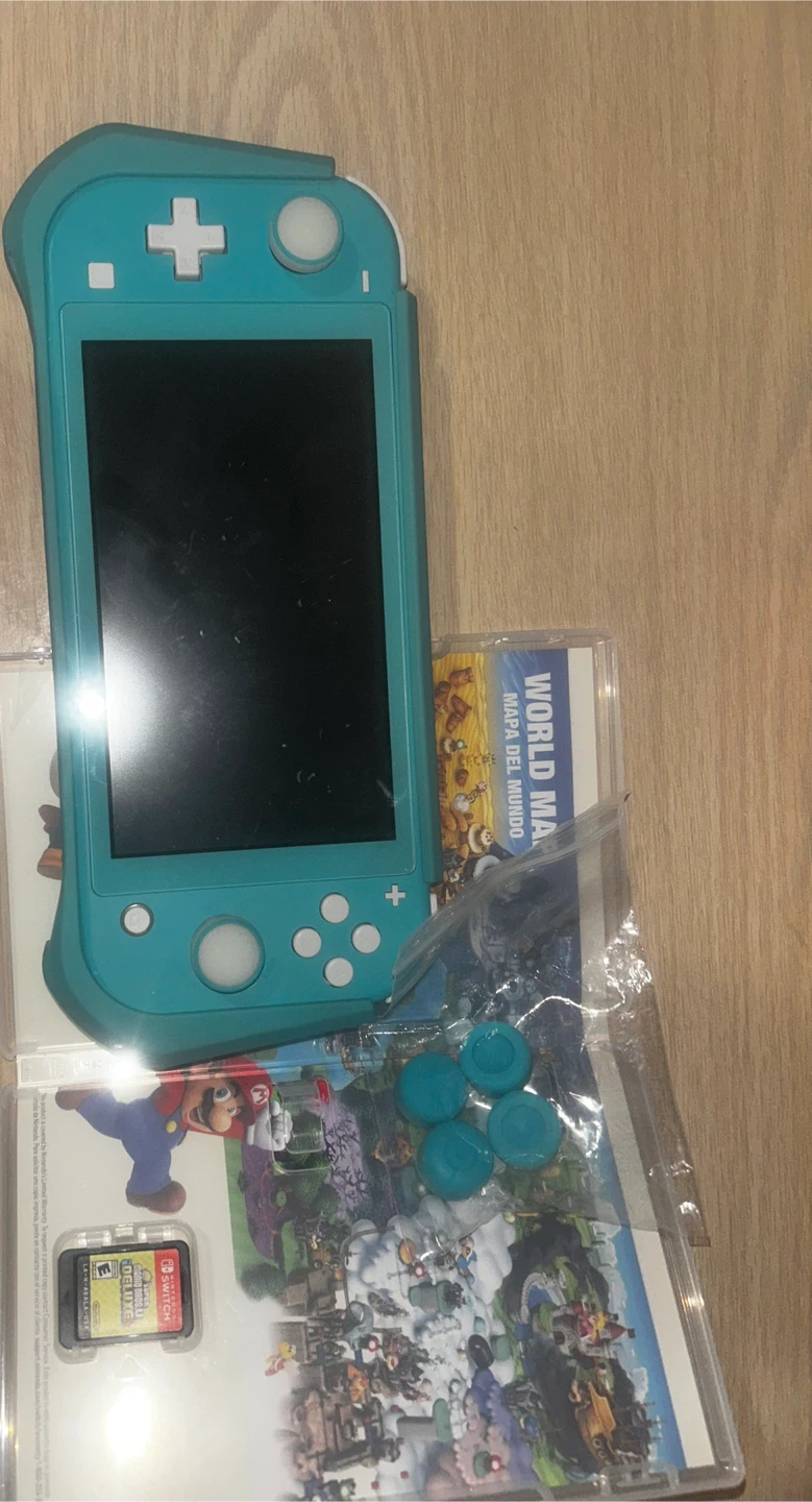 Nintendo Switch Lite Turquoise with Mario Deluxe Game - photo 4