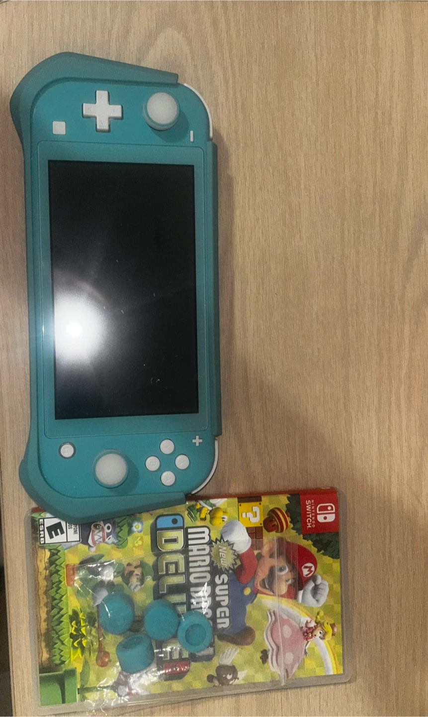 Nintendo Switch Lite Turquoise with Mario Deluxe Game - photo 3