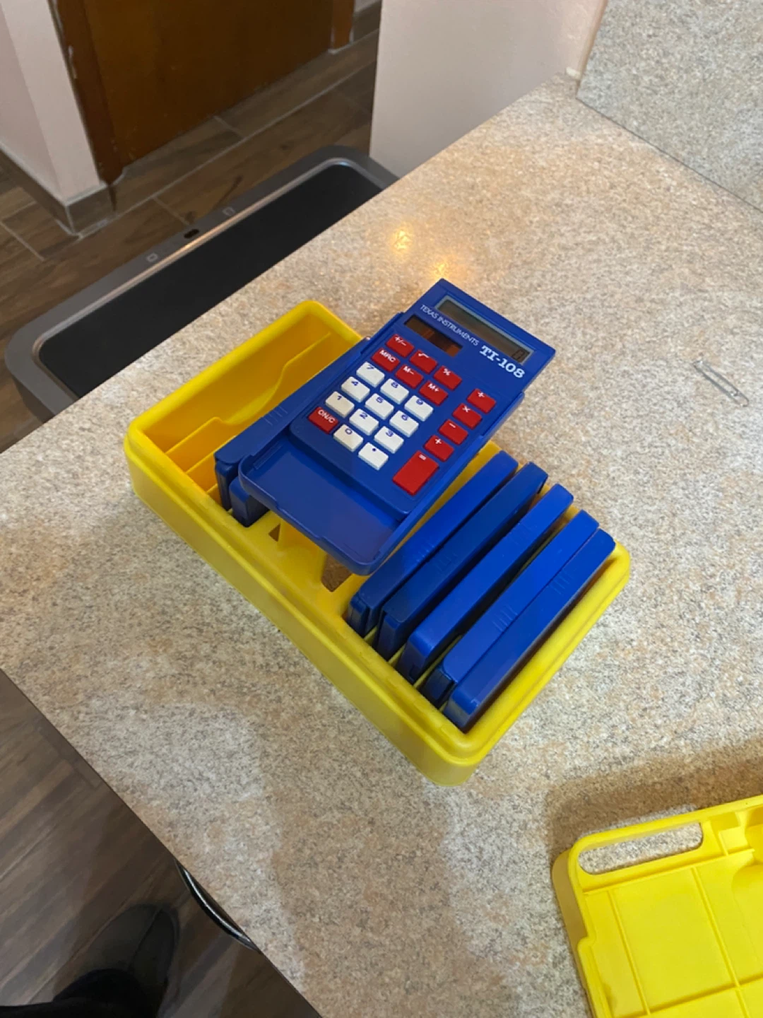 8 Texas Instruments calculators with case