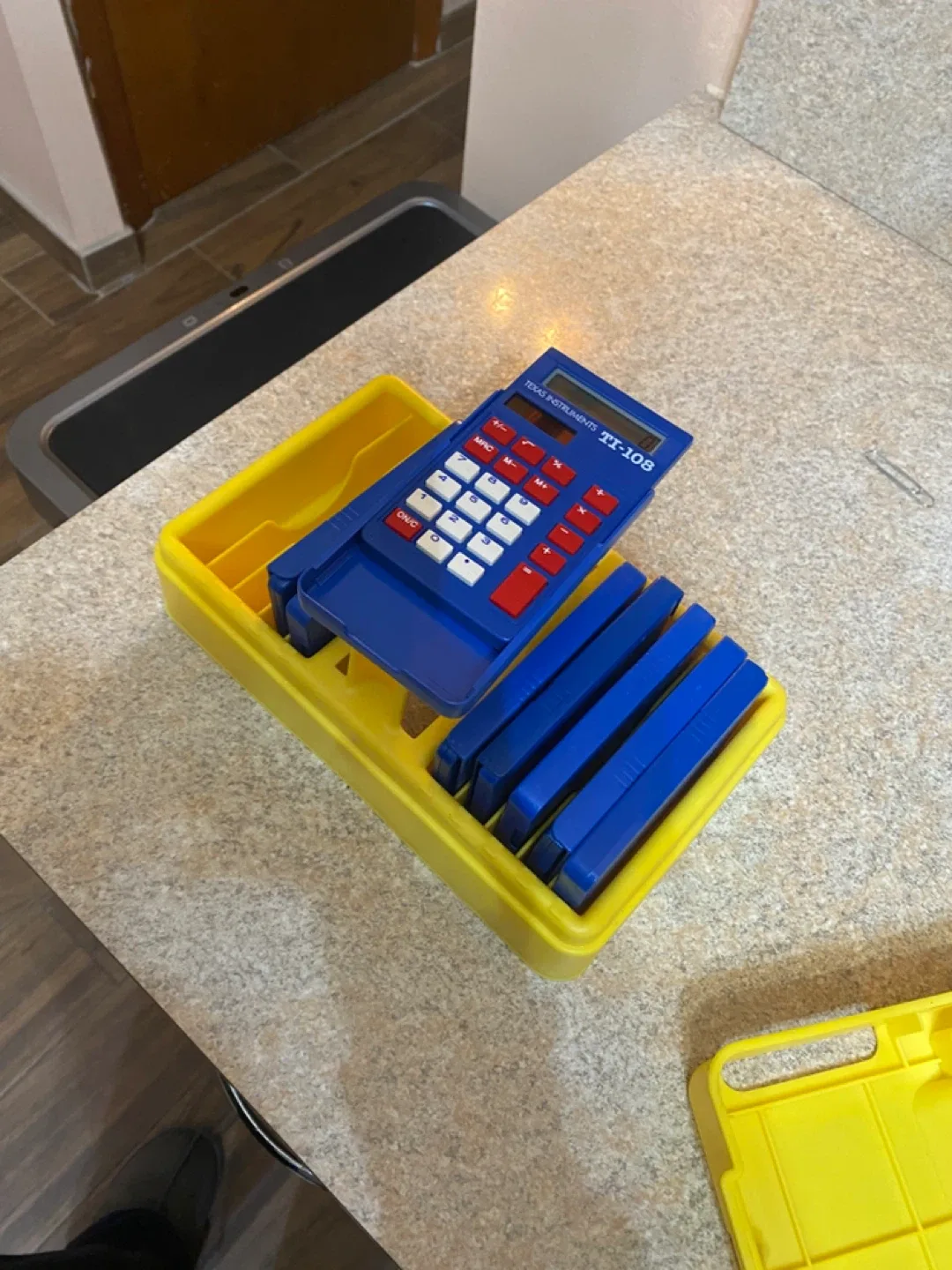 8 Texas Instruments calculators with case