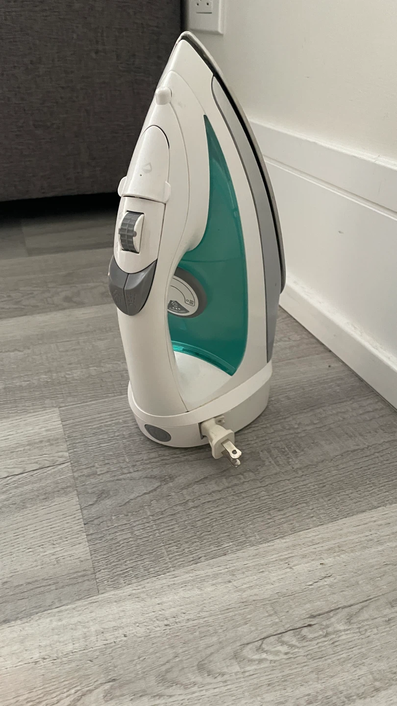 Iron with small ironing board