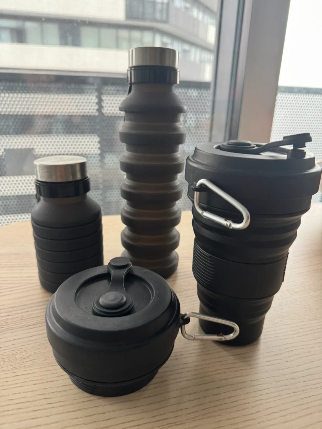 Collapsible silicone water bottles and coffee cups