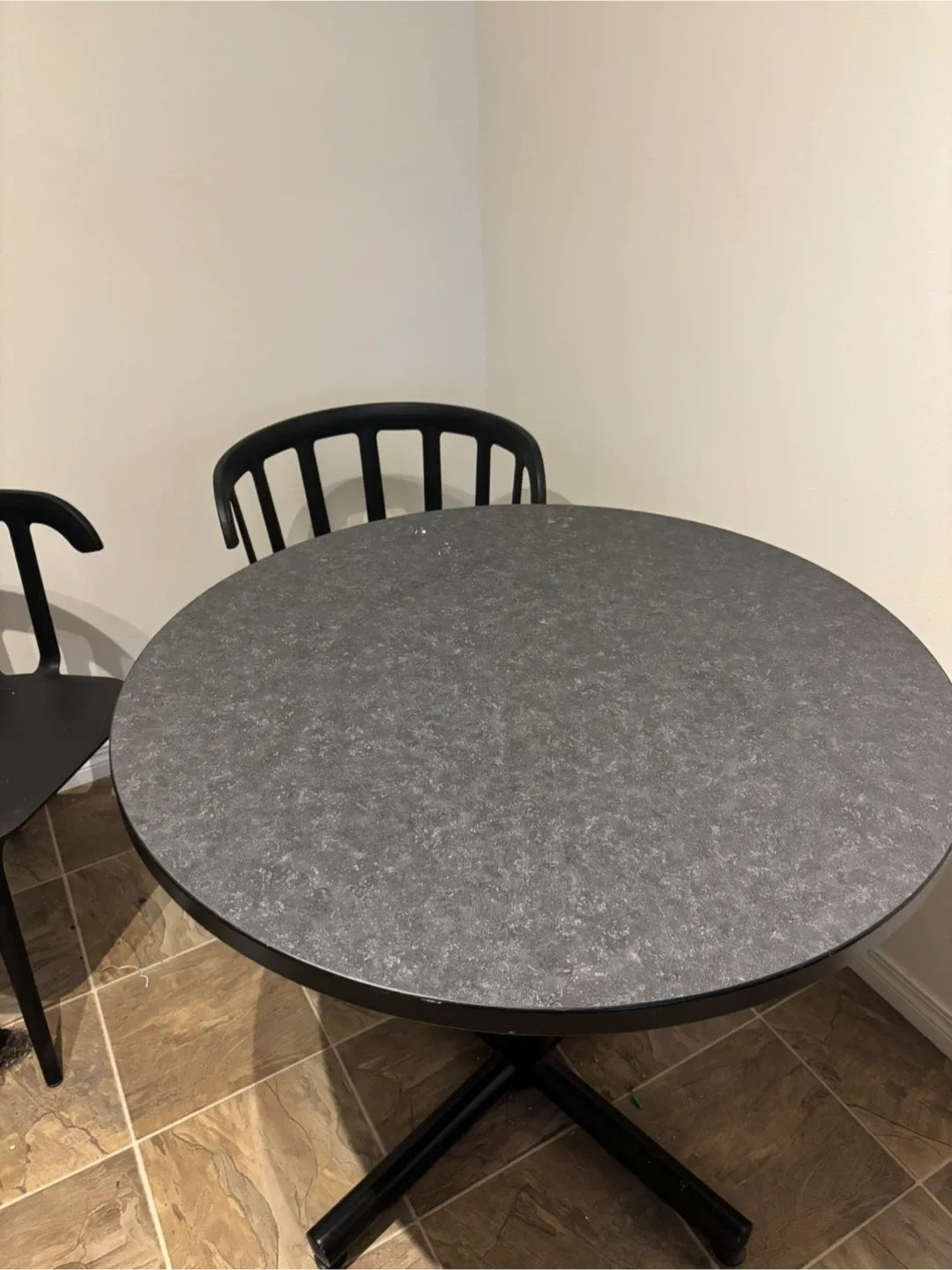 Round grey table and chairs