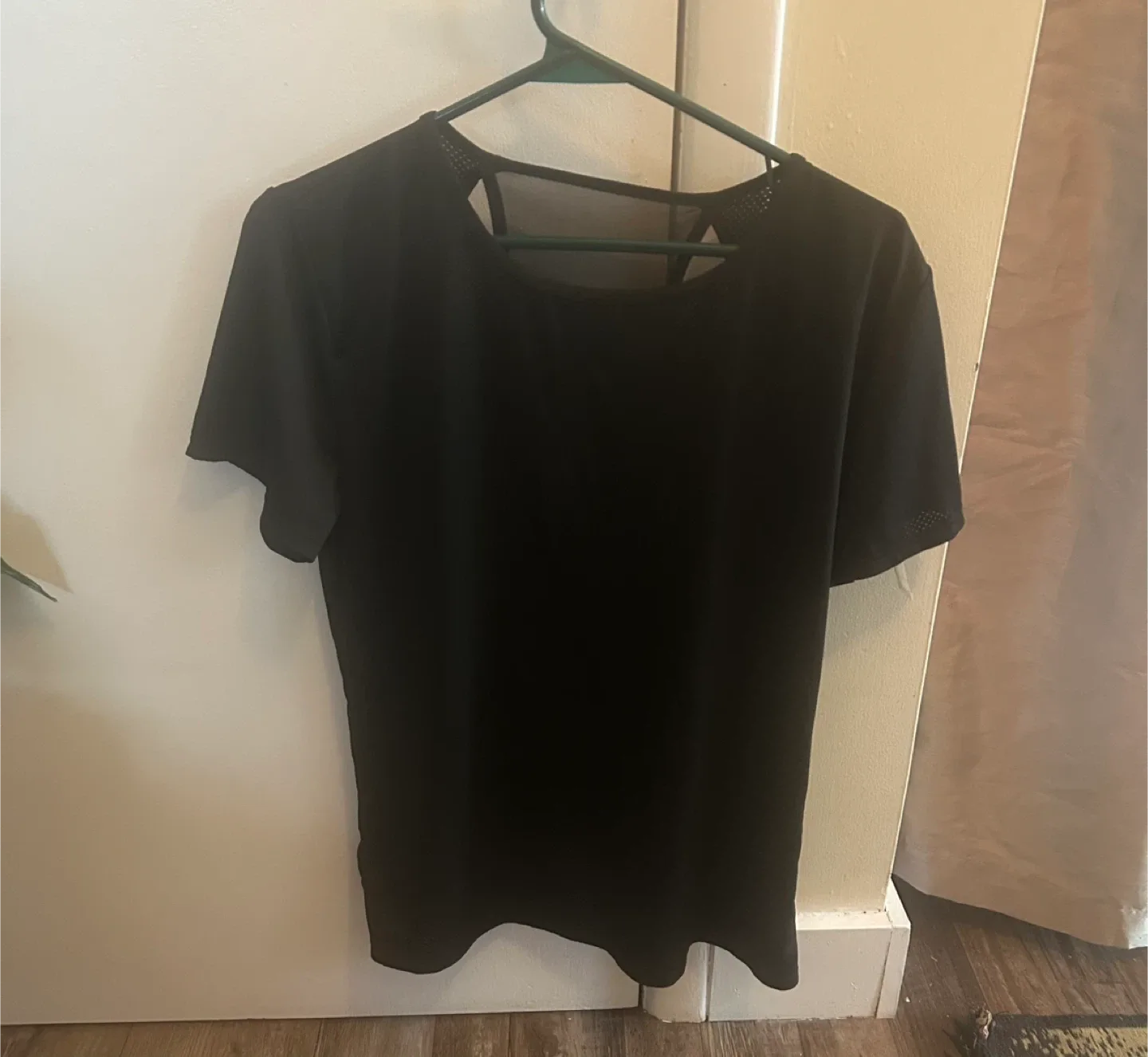 SHEIN black athletic top with different patterns in back