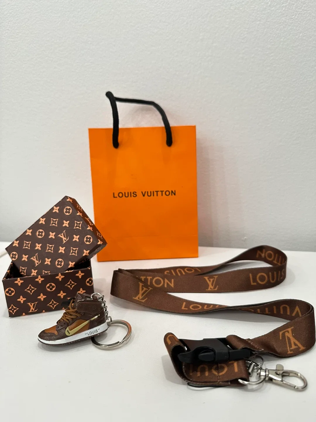 Louis Vuitton Sneaker Keychain & Lanyard Set image indicator(2)