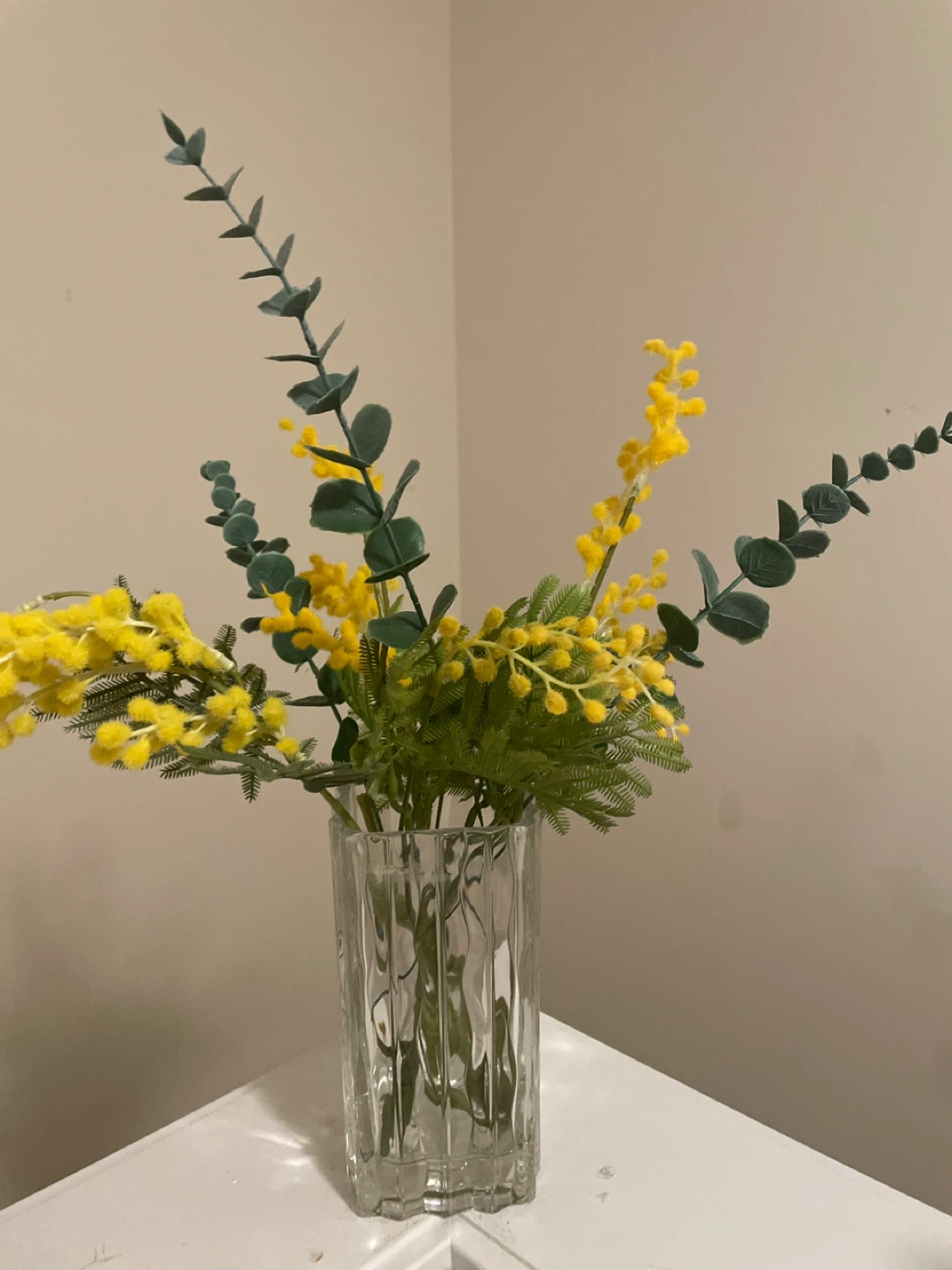 Glass Vase with beautiful artificial flowers