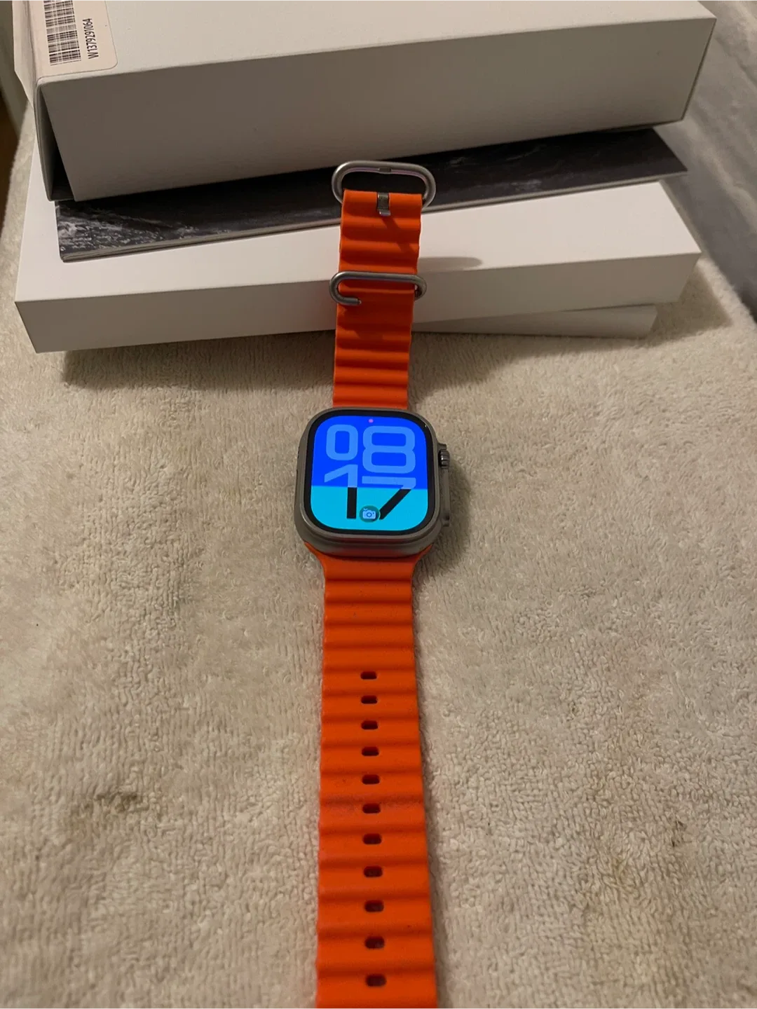 Apple Watch Ultra 49mm Titanium Case with Orange Band