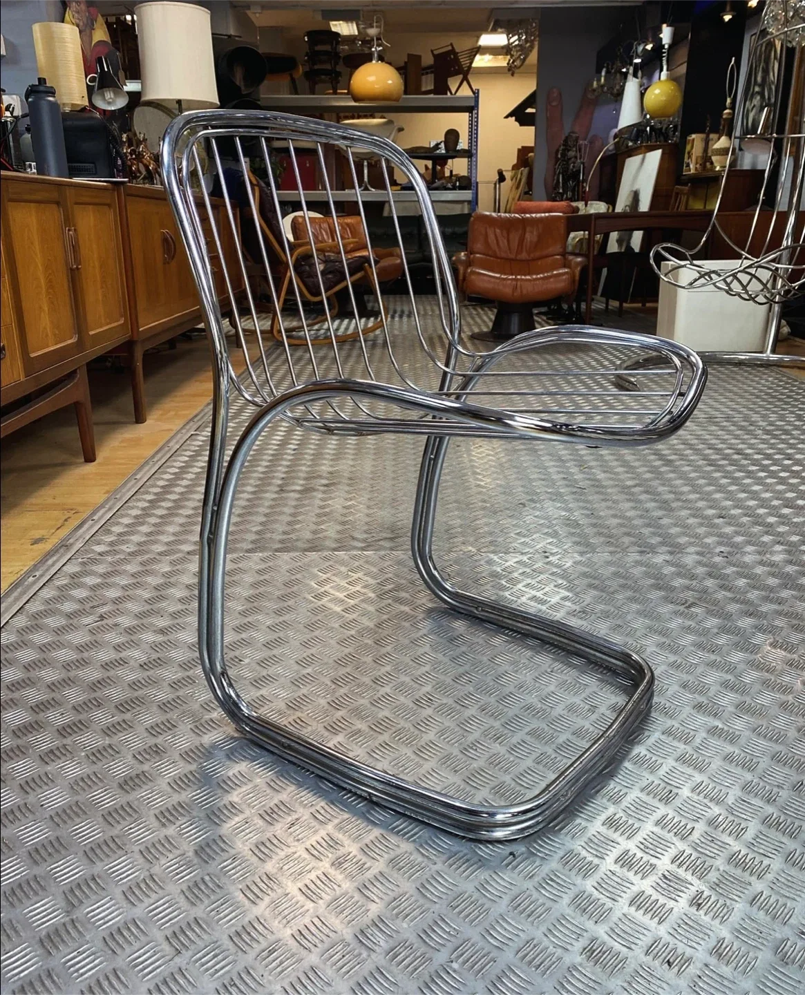 Mid century chrome cantilever chair designed by Gastone Rinaldi