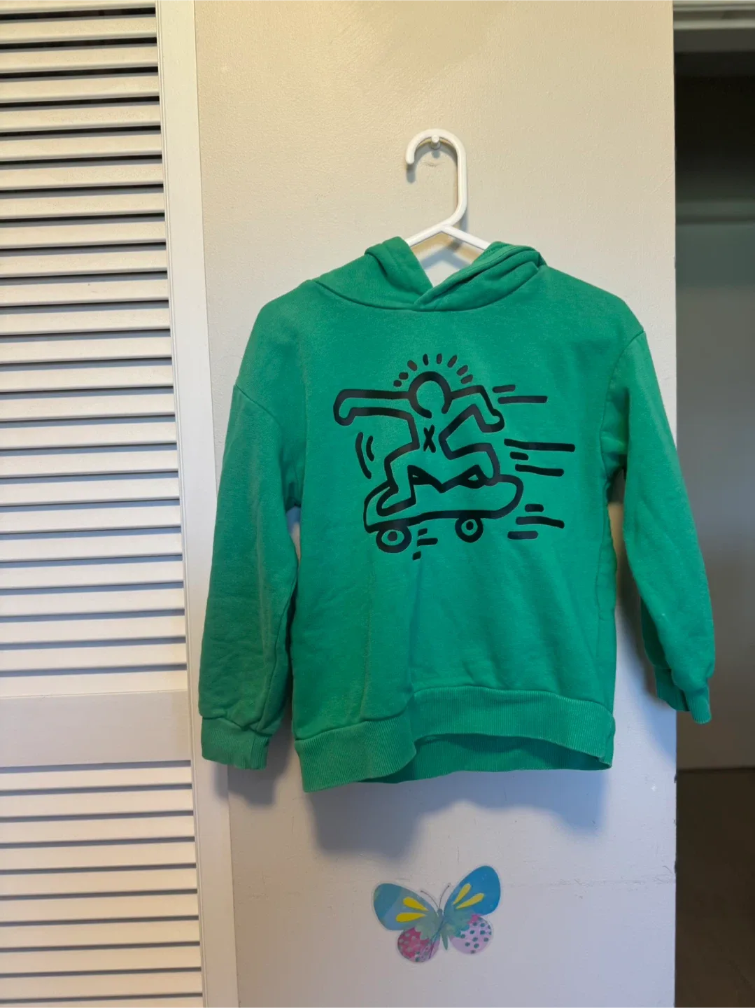 Green Hoodie with Skateboard Design