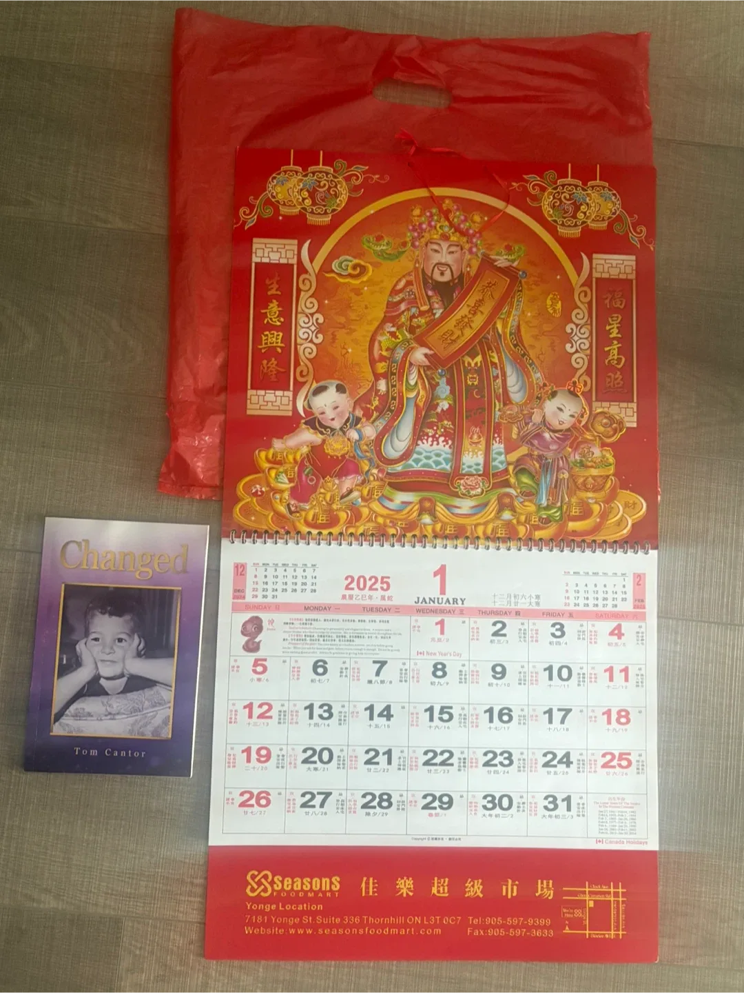 2025 Calendar and a book