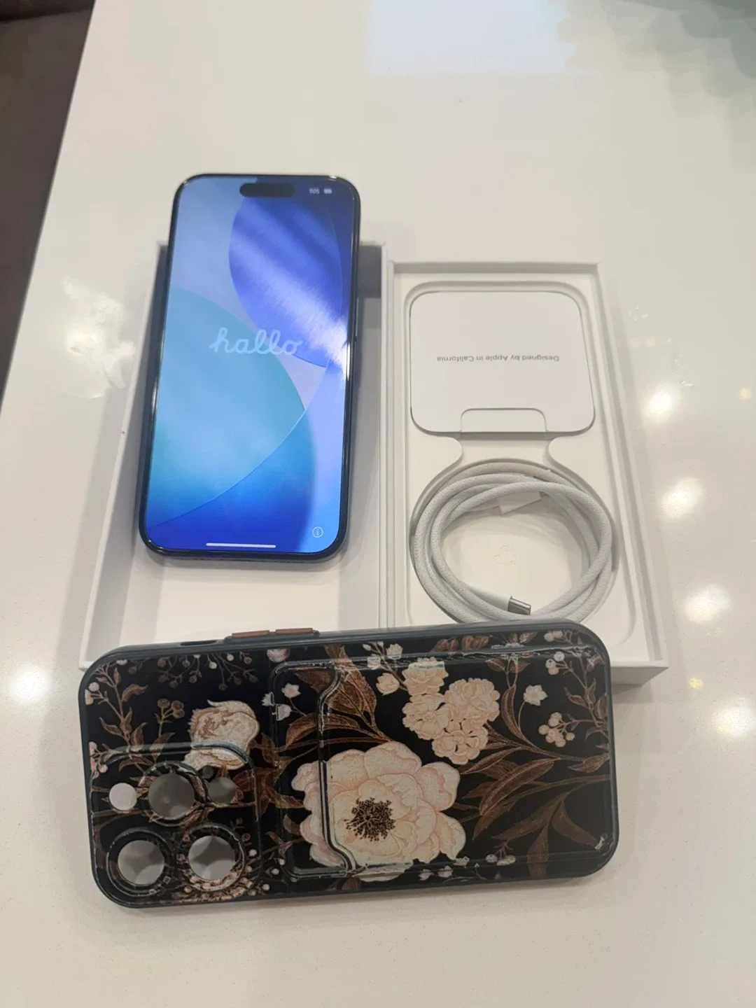 Unlocked IPhone 15 Pro, 128GB in titanium blue color for sale