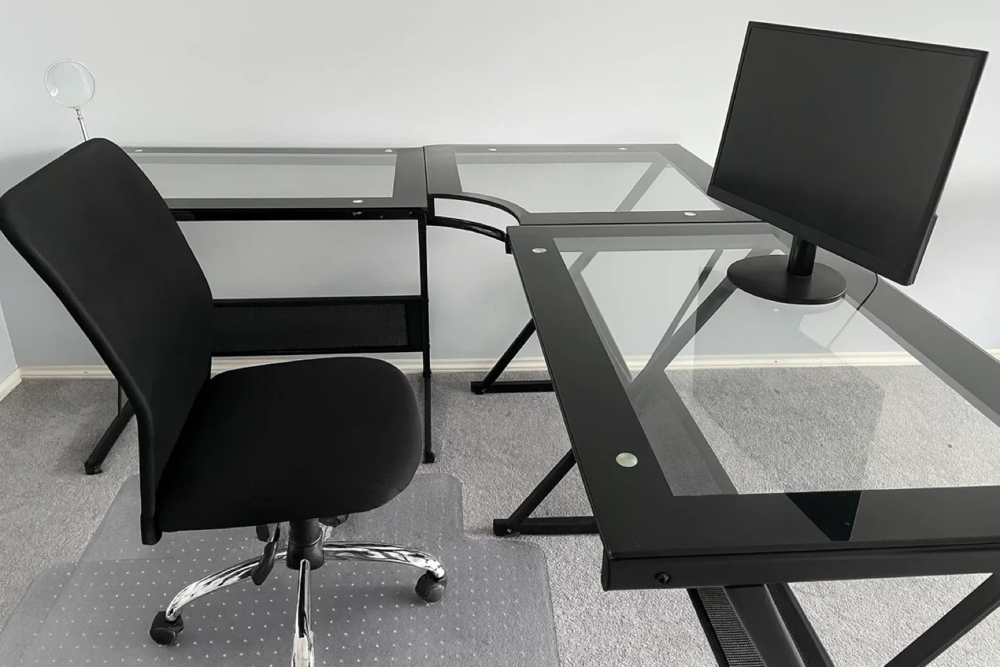 Black Glass Corner Desk with Chair and Monitor