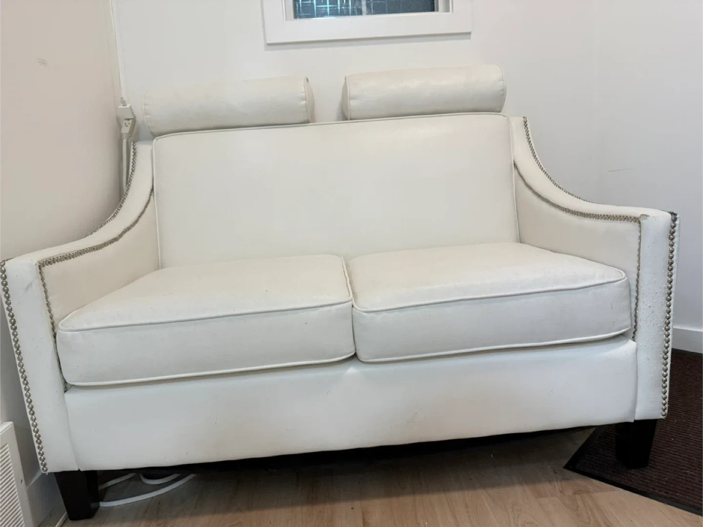 White Loveseat Sofa with Bolsters