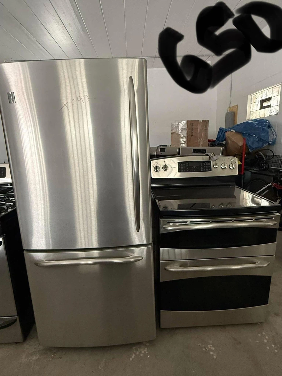 Kenmore Stainless Steel Refrigerator and Range