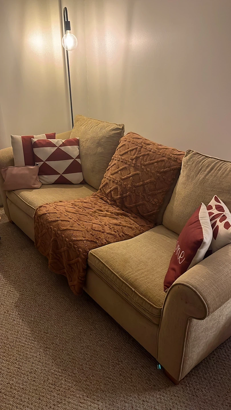 Comfortable Beige/Light Yellow Sofa with Pillows