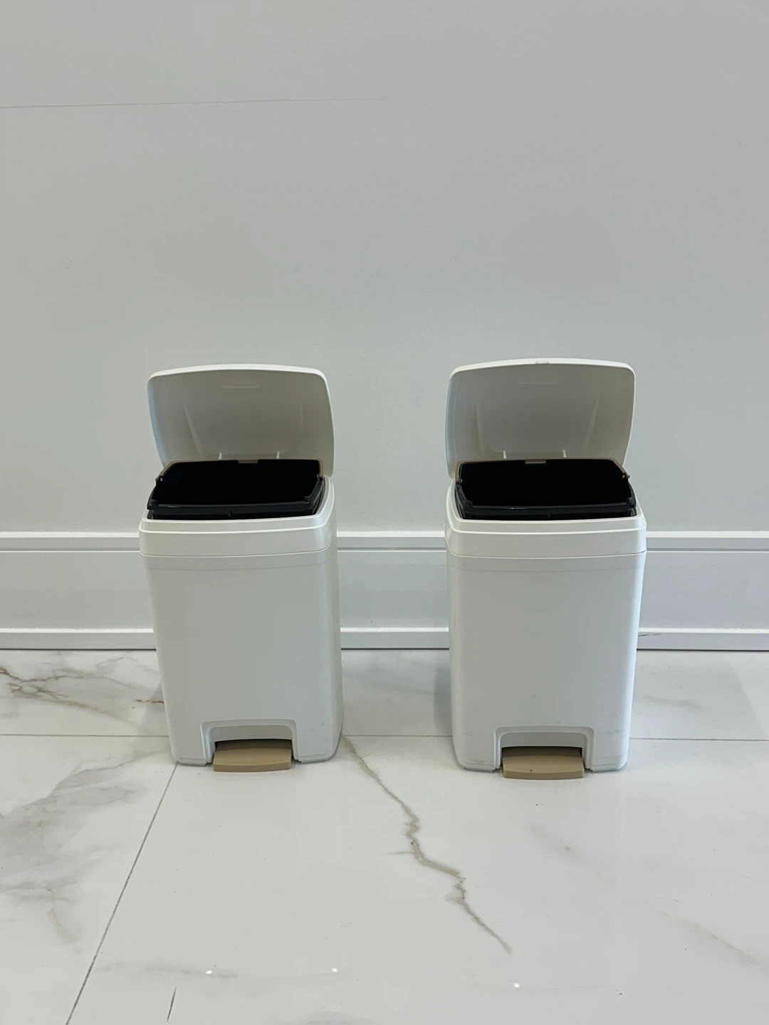 Two White Step-On Trash Cans