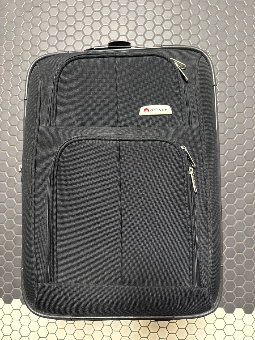 Delsey Black Rolling Suitcase
