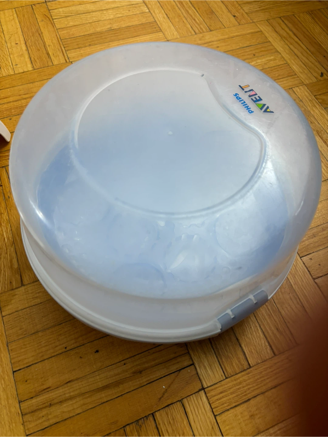 Both Philips Avent steam sterilizer and munchkin Drying Rack