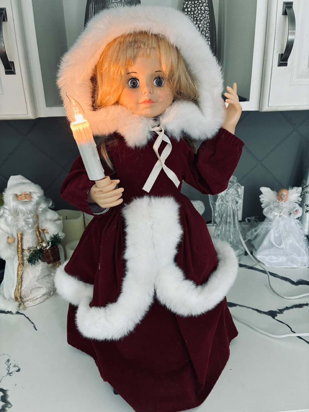 Gorgeous light up candle, moving Christmas girl caroler