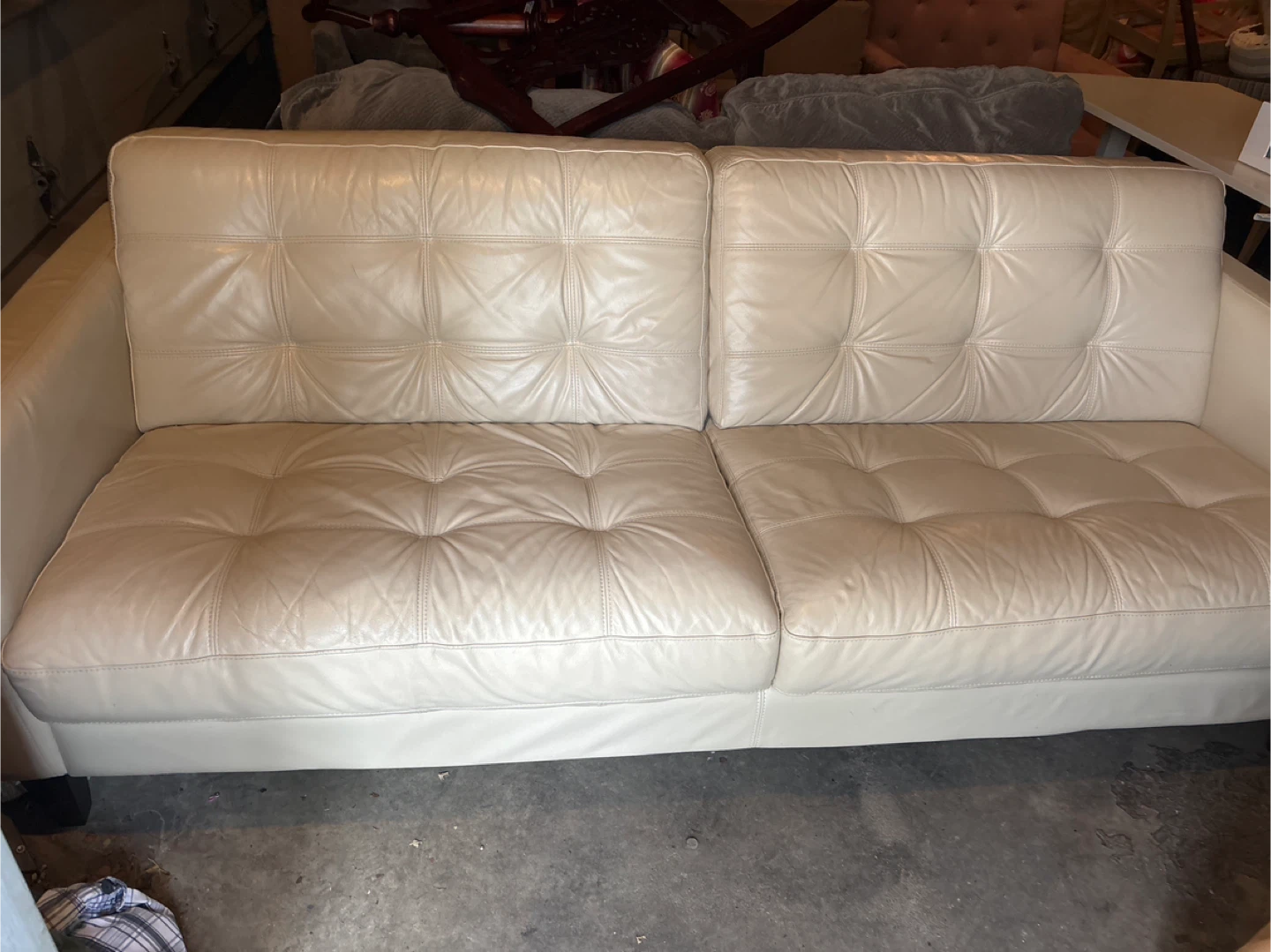 Macys white leather couch. Garage pick up $100 firm
