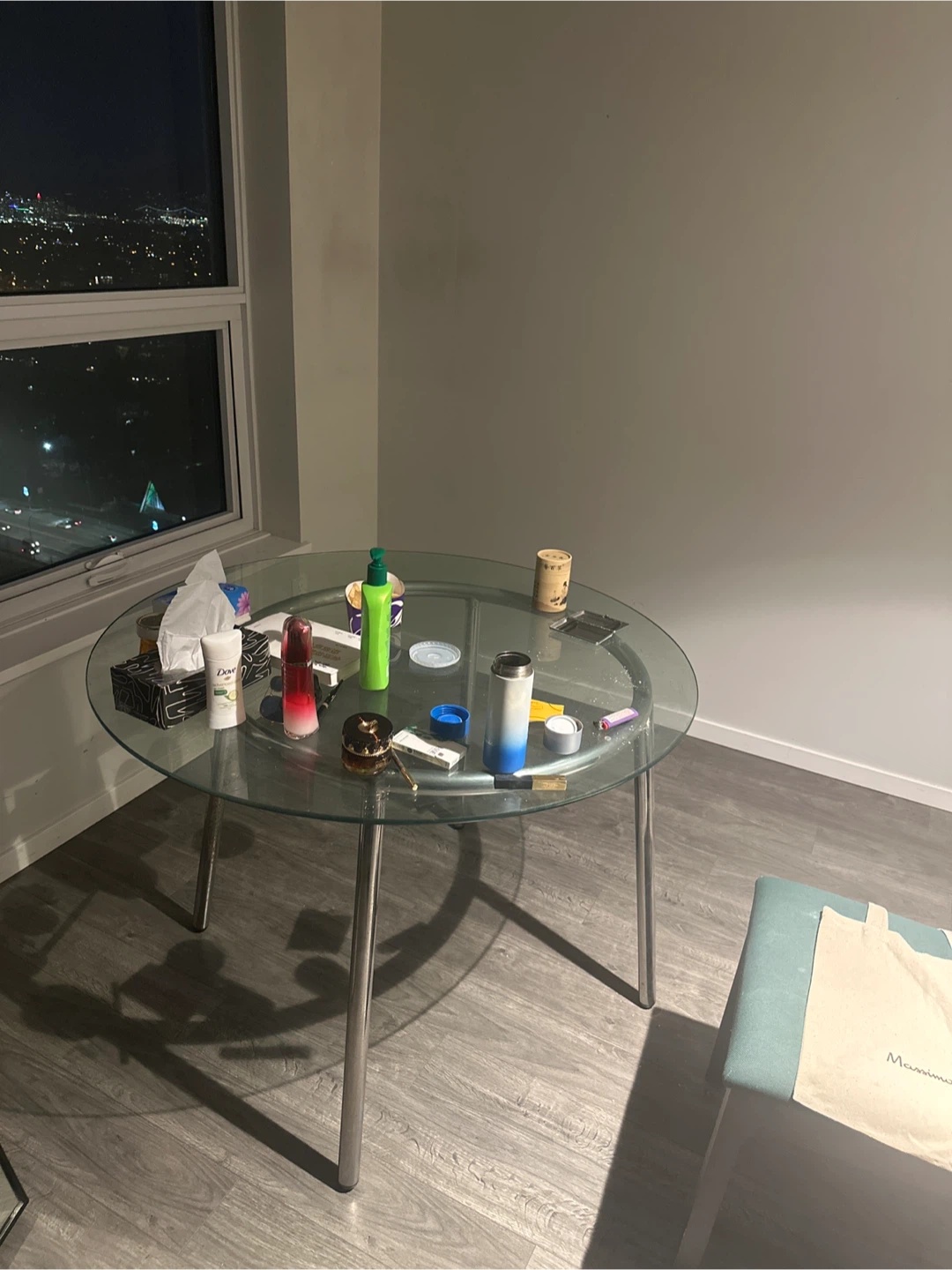 Glass top dining table with chrome legs