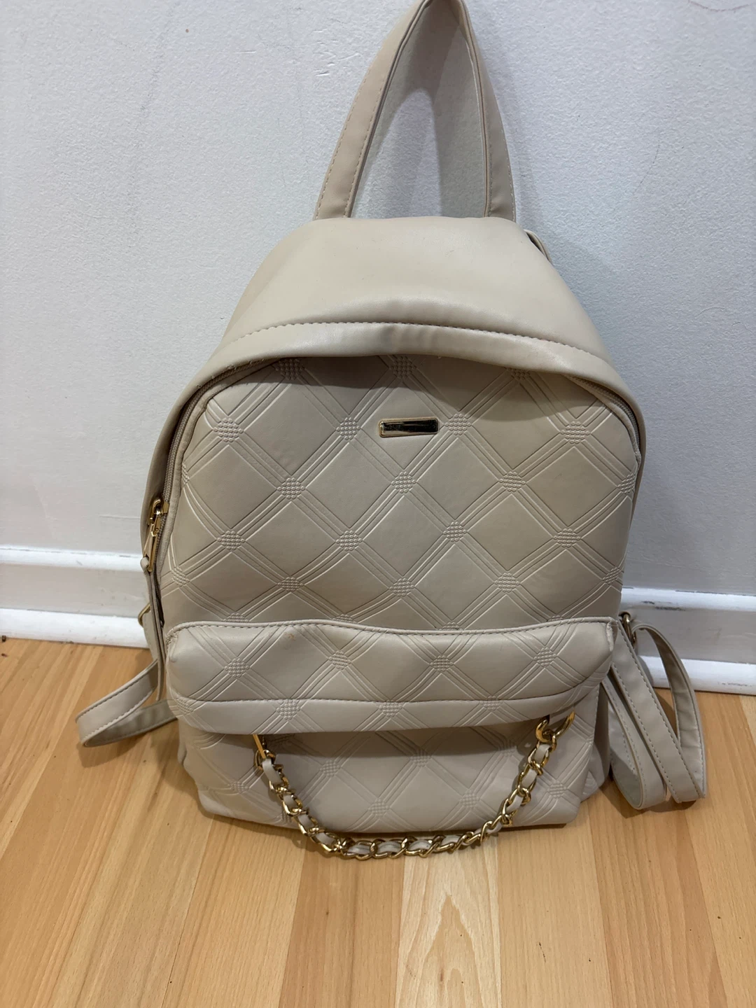 Beige Quilted Backpack with Gold Chain