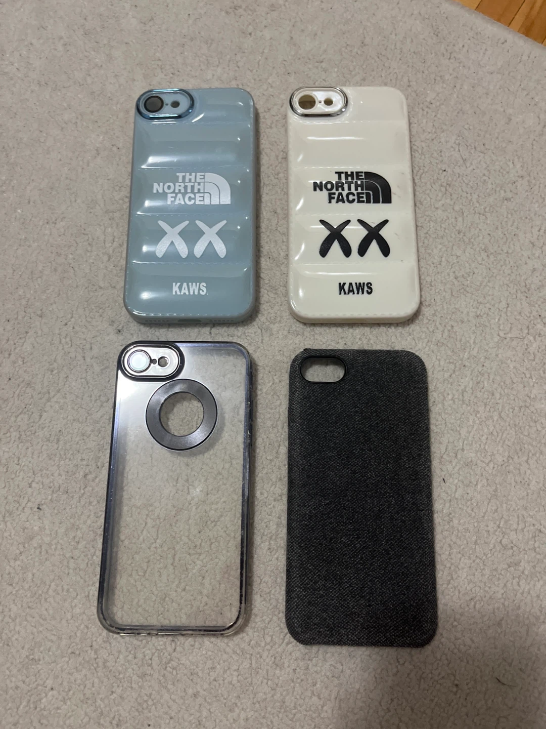 4 iPhone 8 cases, 1 iPhone X case, and 2 iPhone 12 Pro cases