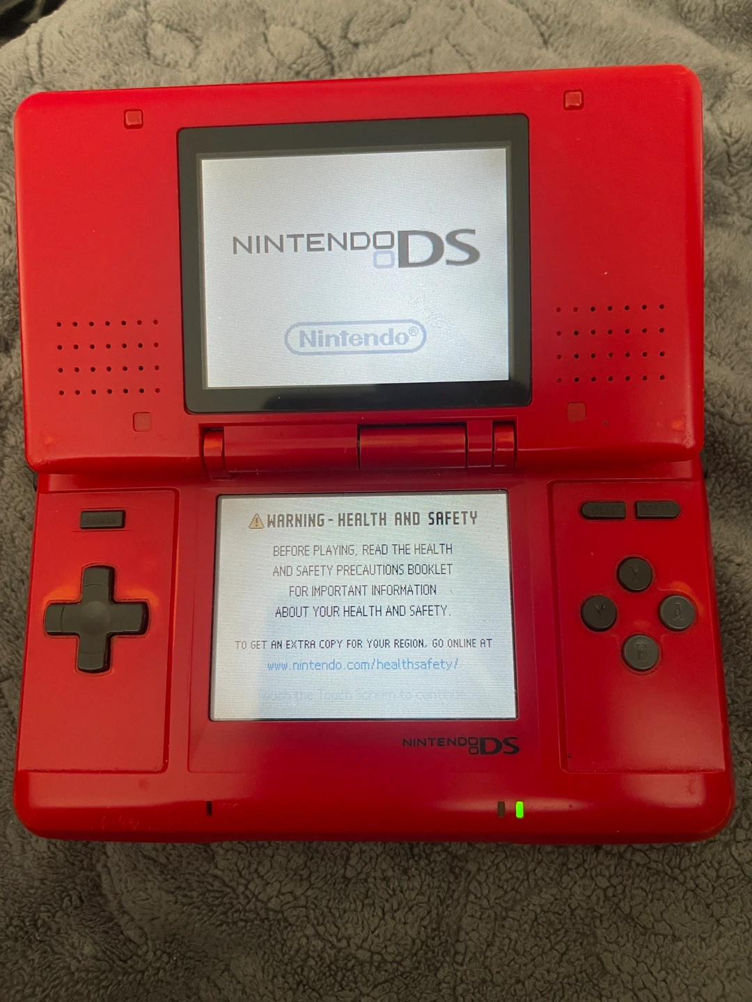 Red Nintendo DS with Games Model NTR-001
