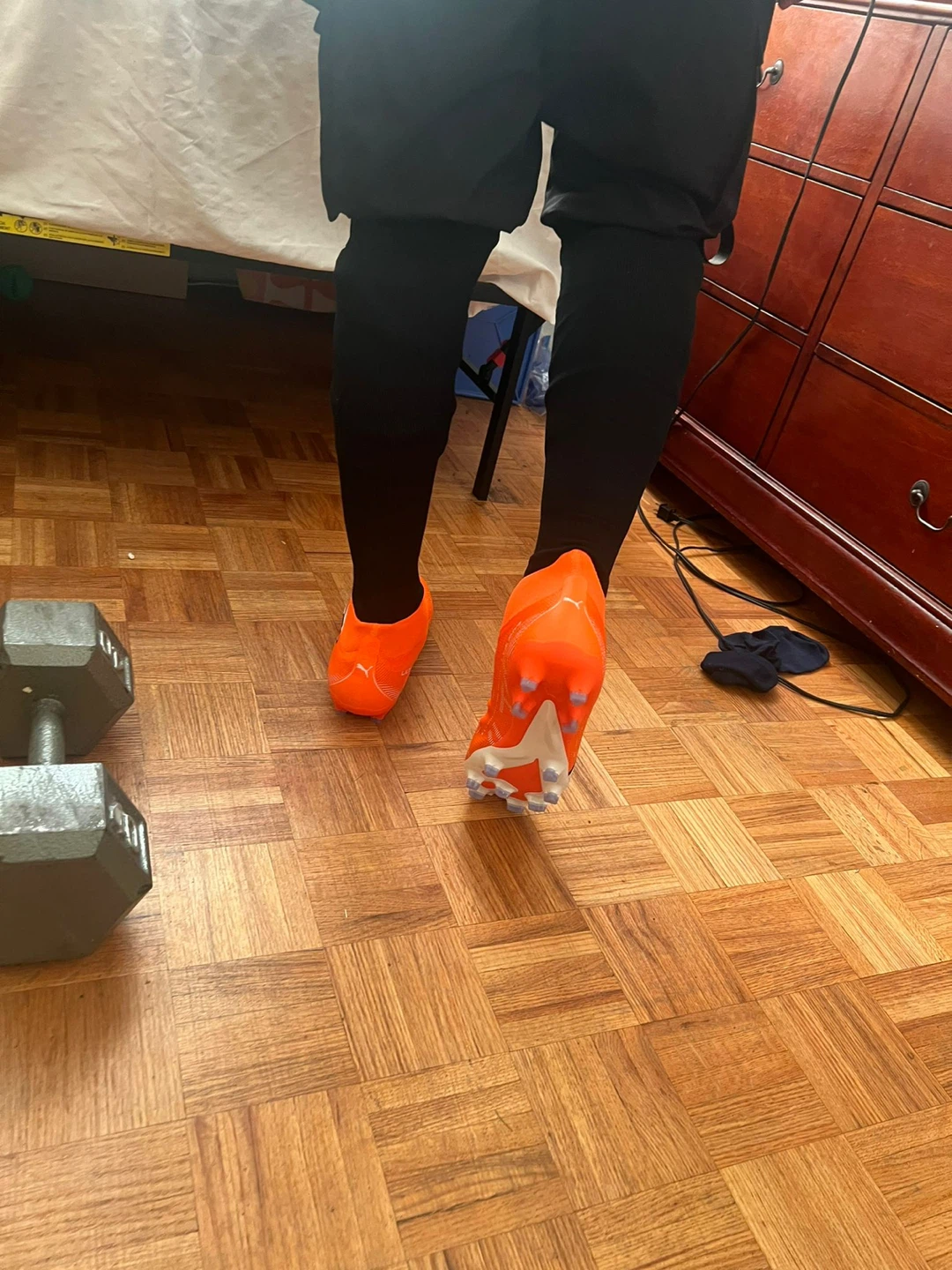 Orange puma Soccer Cleats