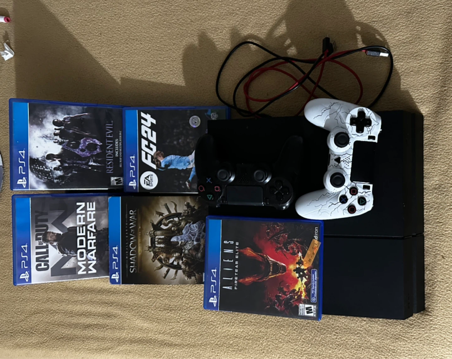 PS4 Console with Games and Controllers