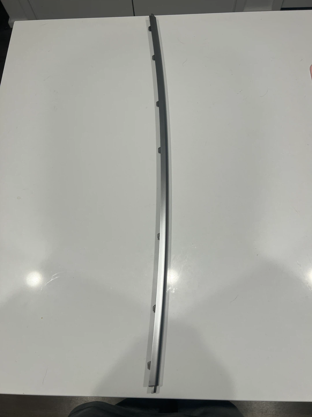Brand new OEM Land Rover front lower bumper trim.