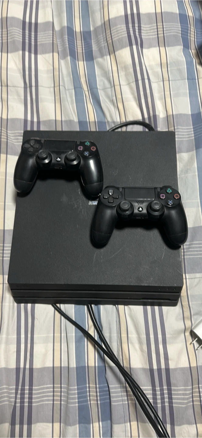 PlayStation 4 Pro with 2 Controllers