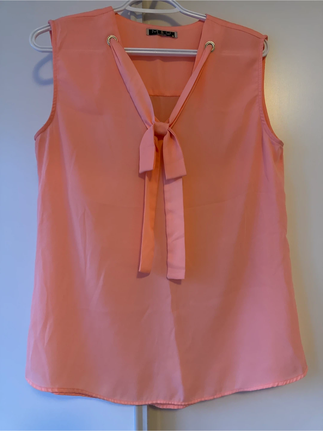 Peach Sleeveless Blouse
