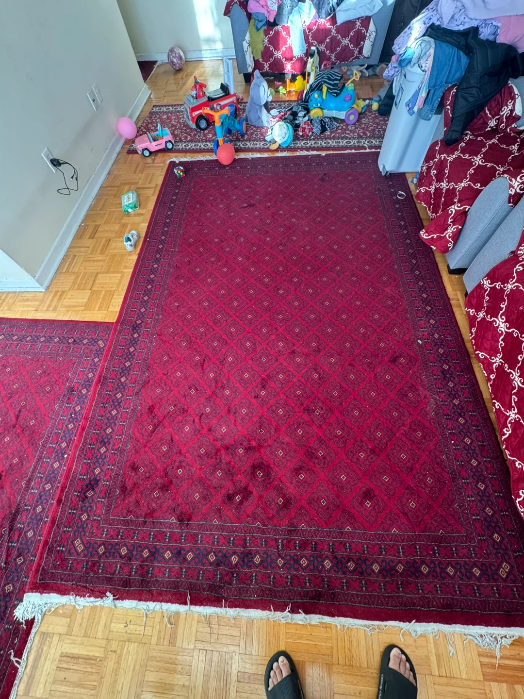 Red patterned area rug