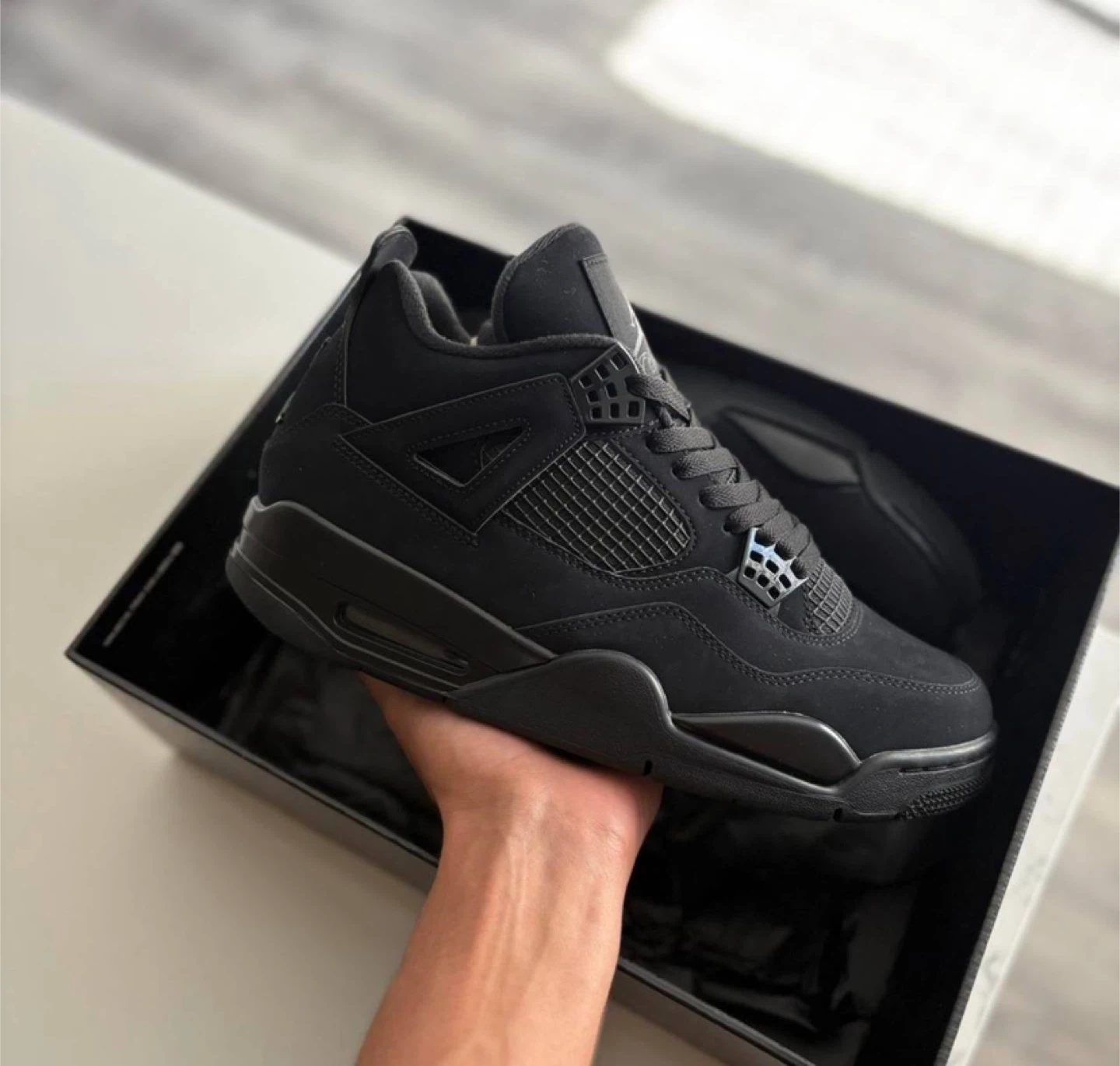 Air Jordan 4 Retro “Black Cat”