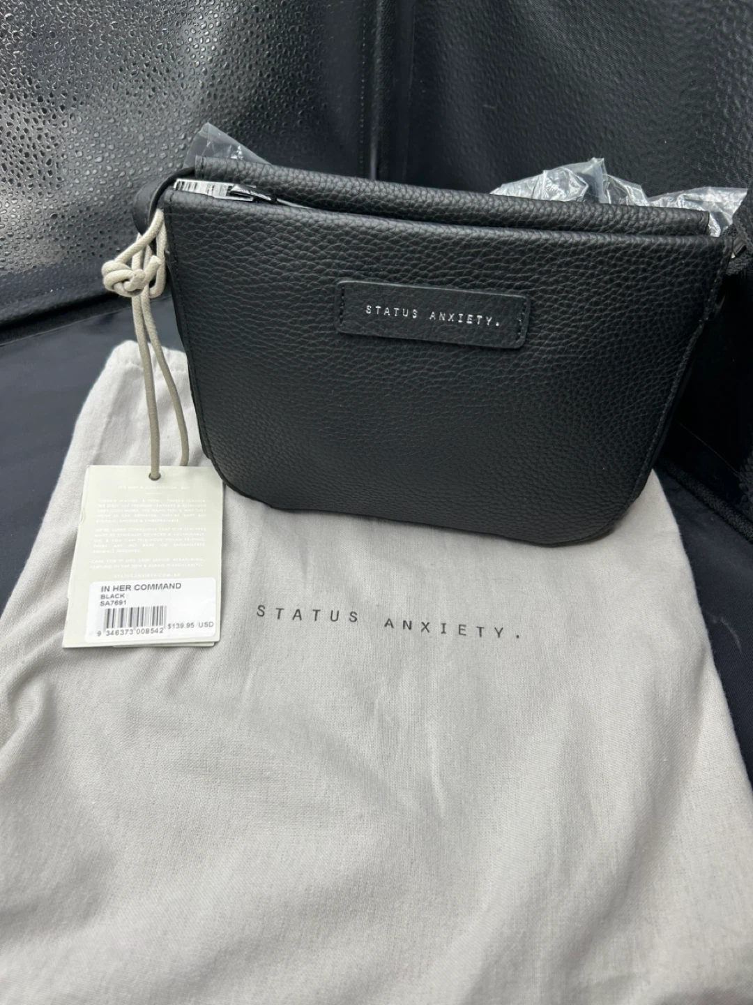 Status Anxiety In Her Command Black Bag