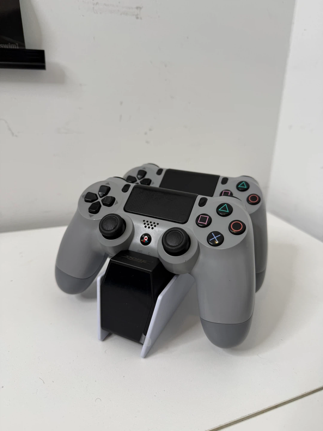 Two DualShock 4 Anniversary edition with charger