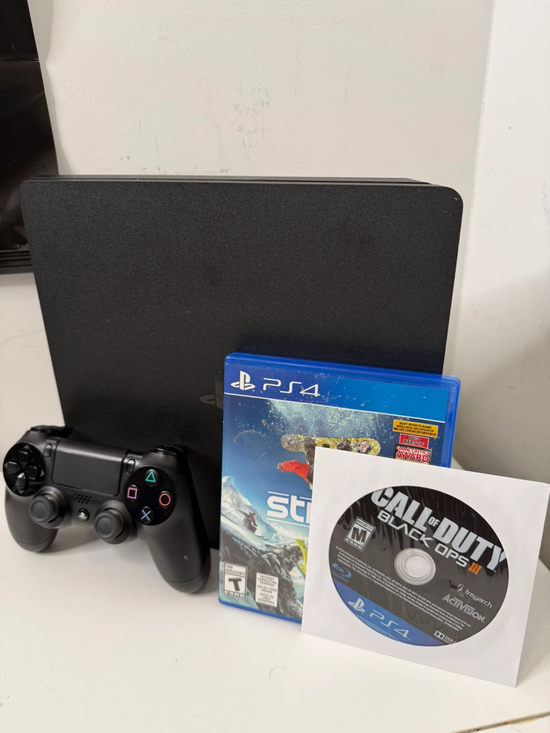 PlayStation 4 Slim + Games - photo 3
