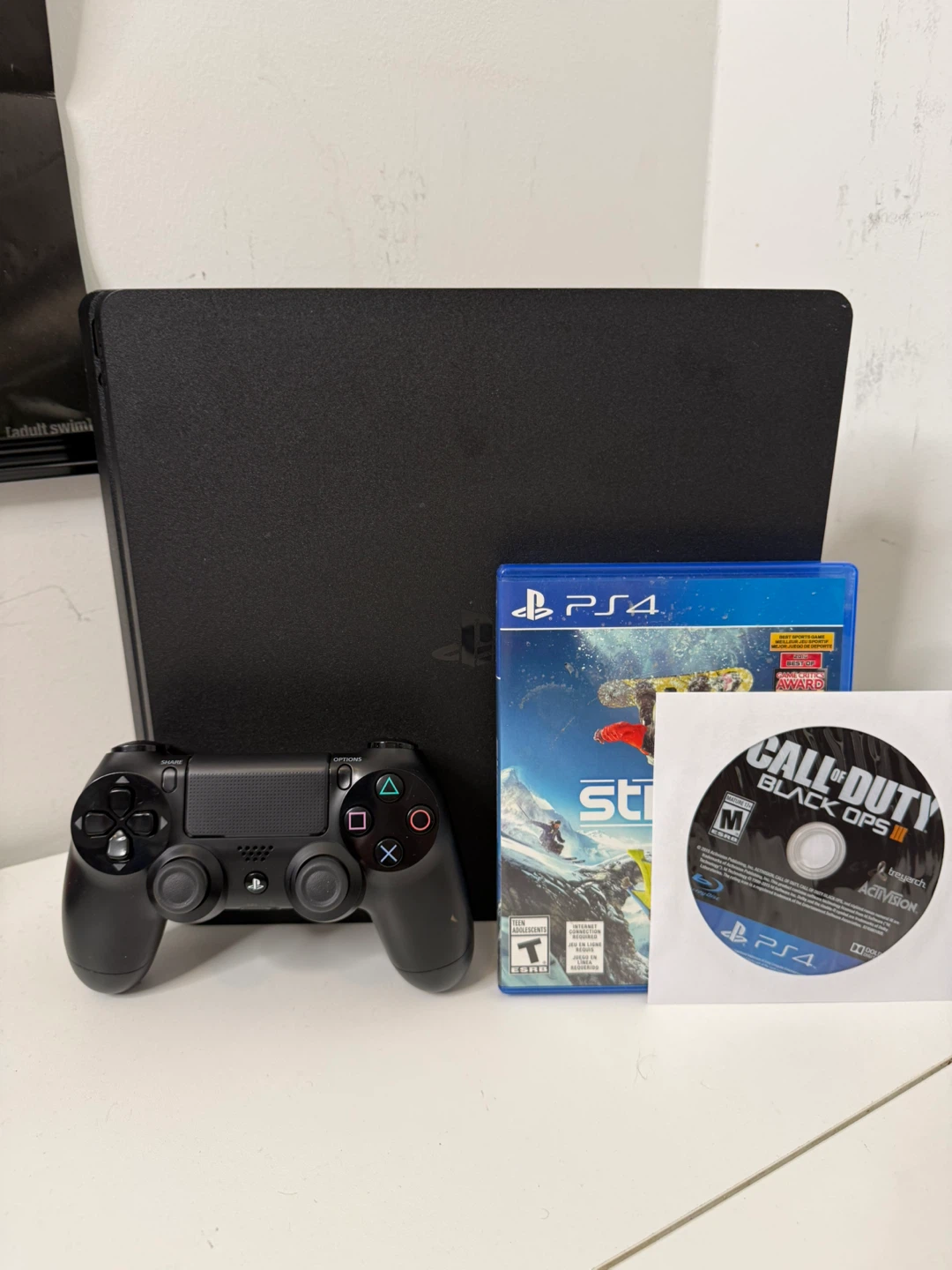 PlayStation 4 Slim + Games