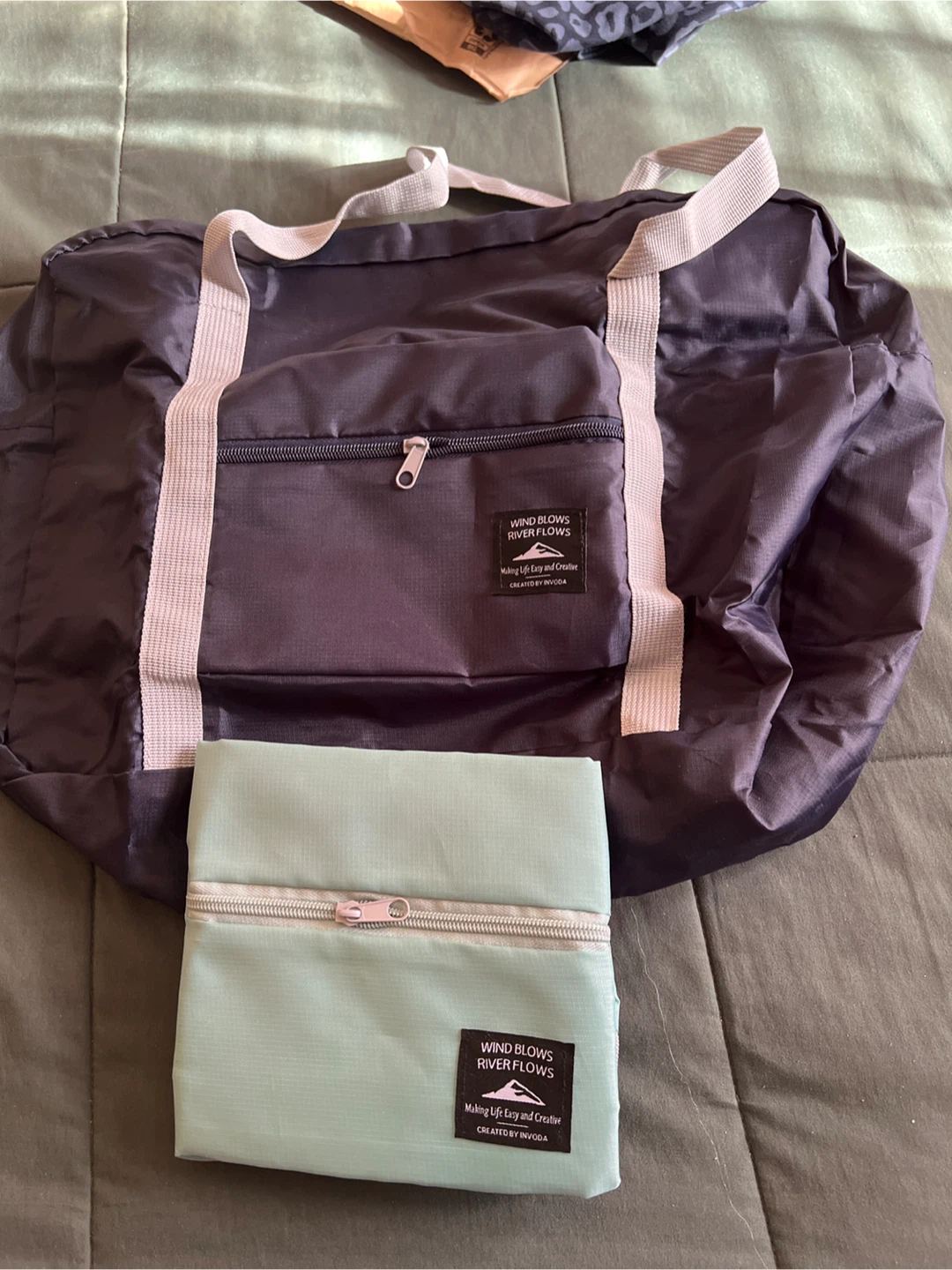 Wind Blows River Flows Foldable Duffel Bag