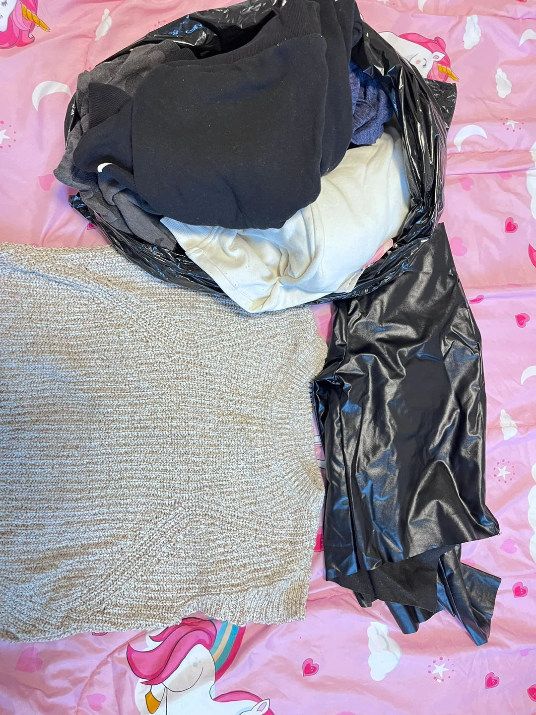 Free Bag of mixed clothing- leather jacket and knitted shirt