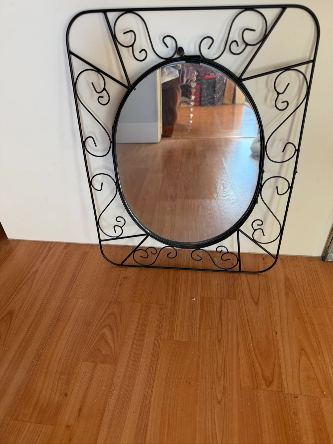 Black Metal Framed Oval Mirror