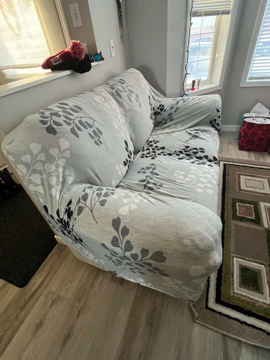 Loveseat with Floral Patterned Sofa Cover