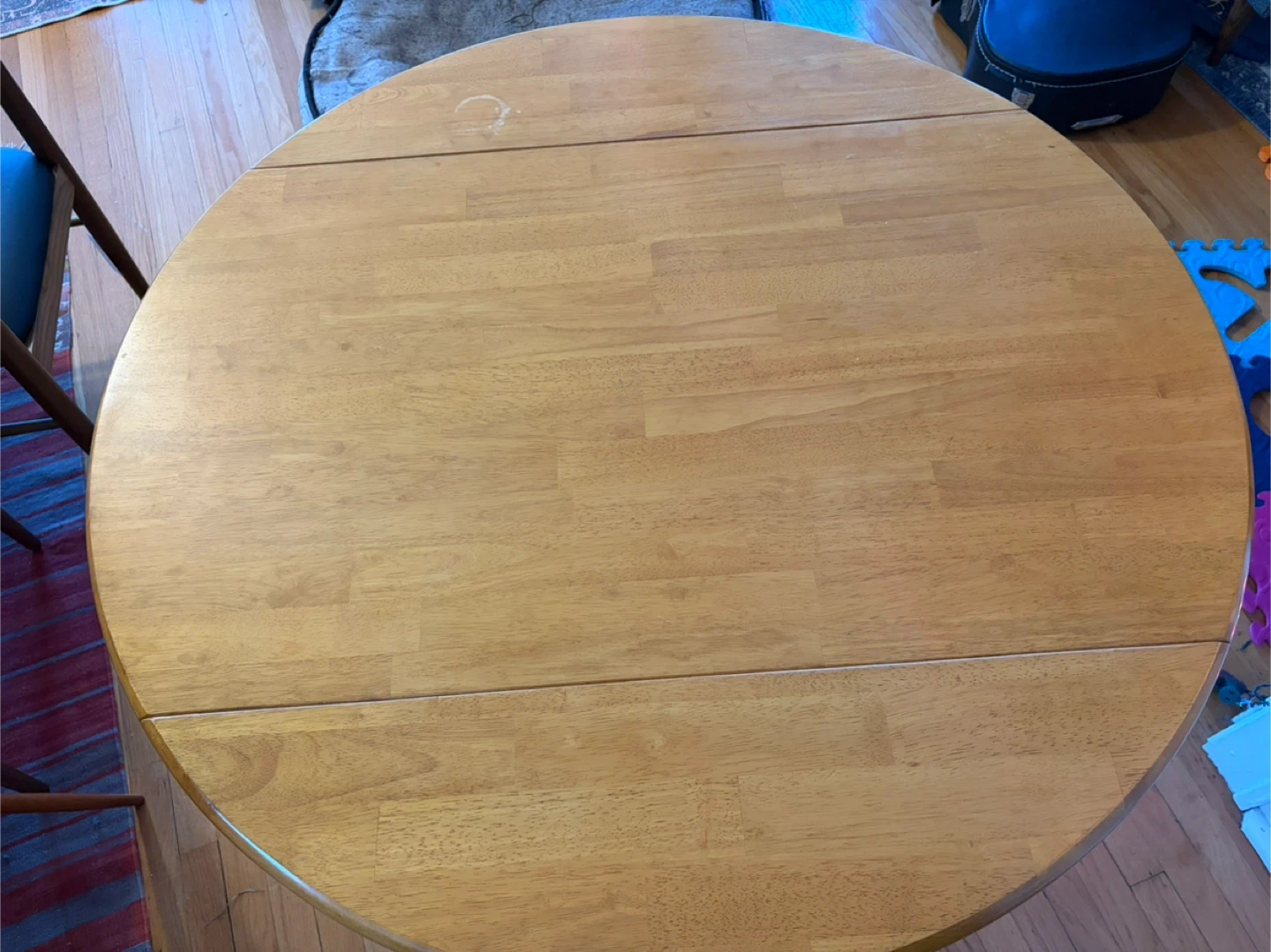 Round Wooden Table- Real wood, drop-leaf, well-designed
