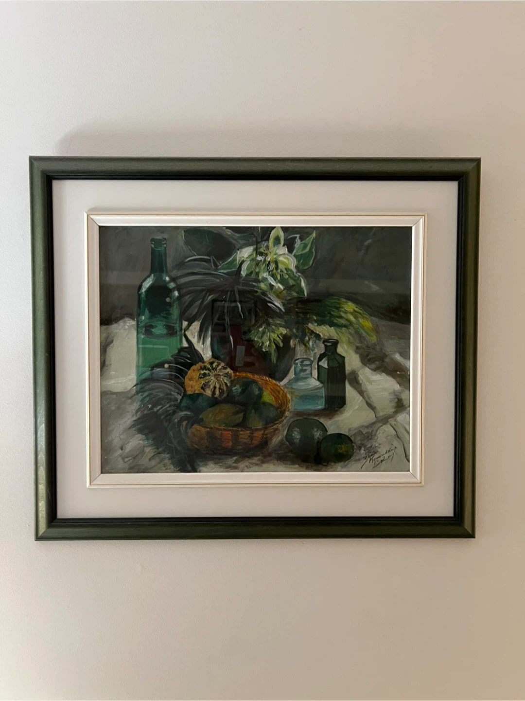 Painting with green frame