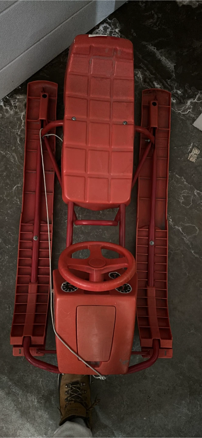 Red Snow Sled with Steering Wheel