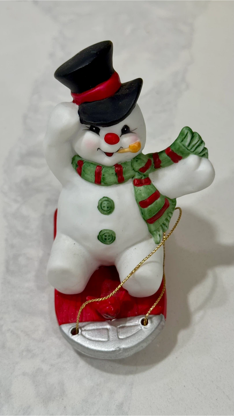 Snowman on Sleigh Figurine