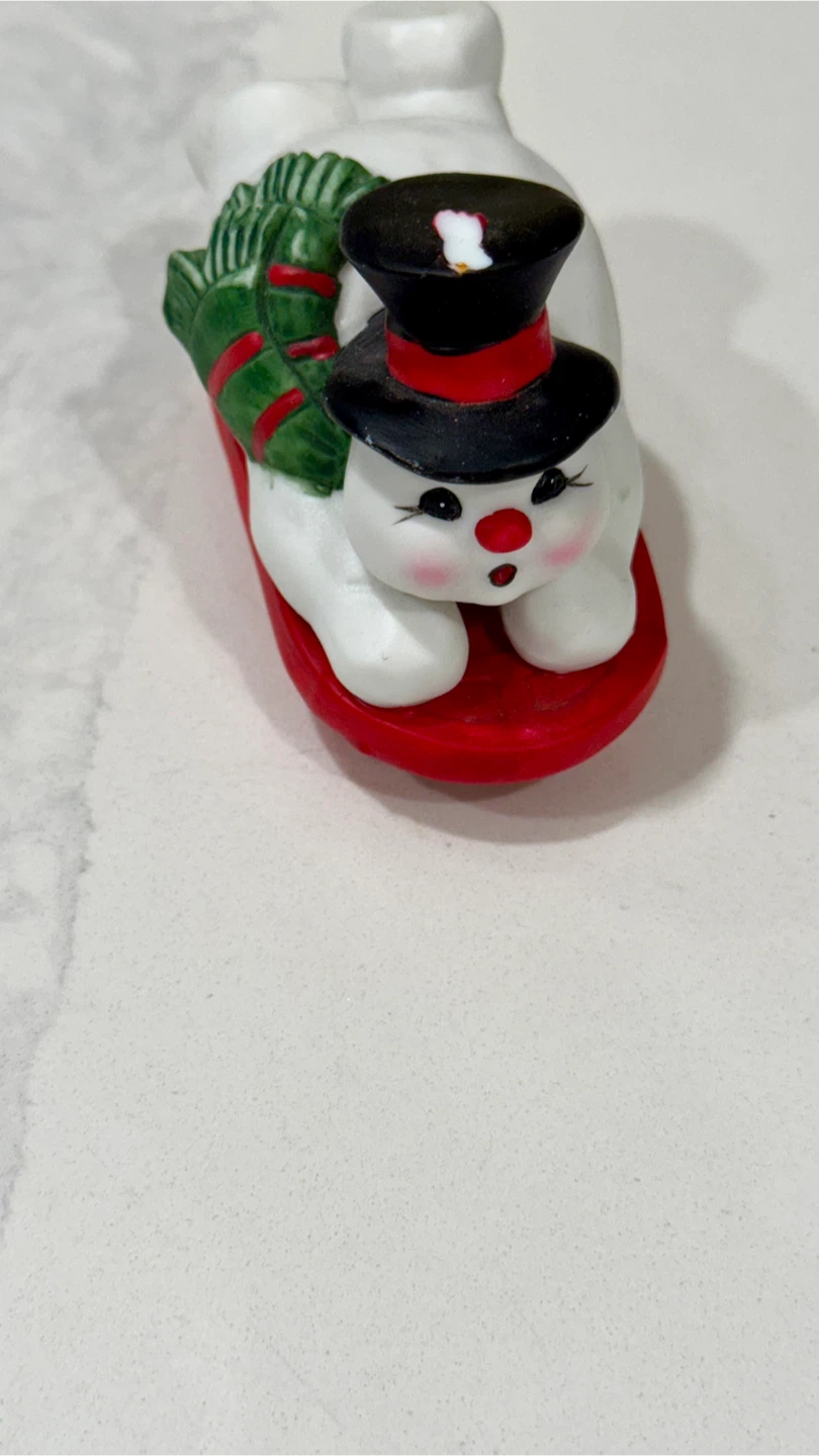 Snowman on Sled Figurine