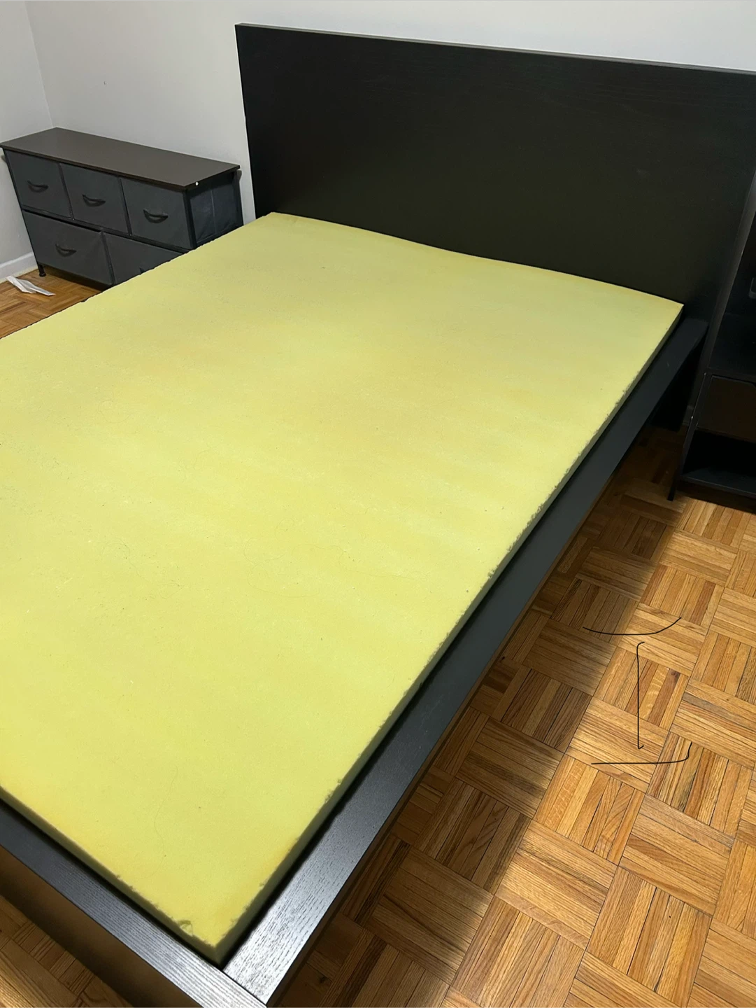Black Bed Frame with Yellow Mattress